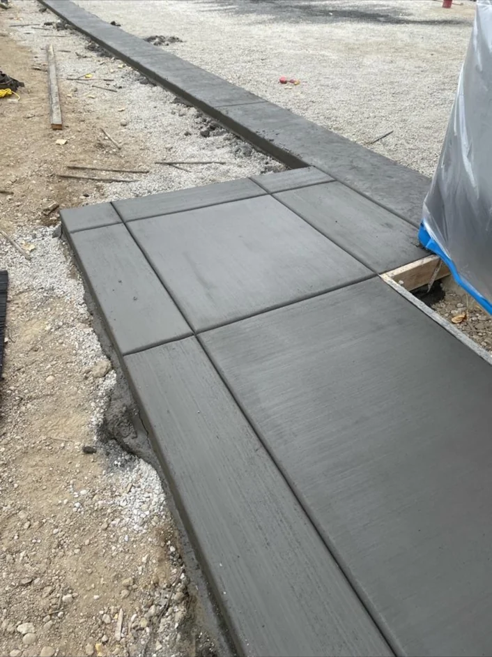Concrete entry walkway with neatly defined edges