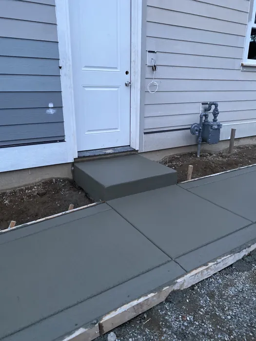 Concrete steps and connecting walkway