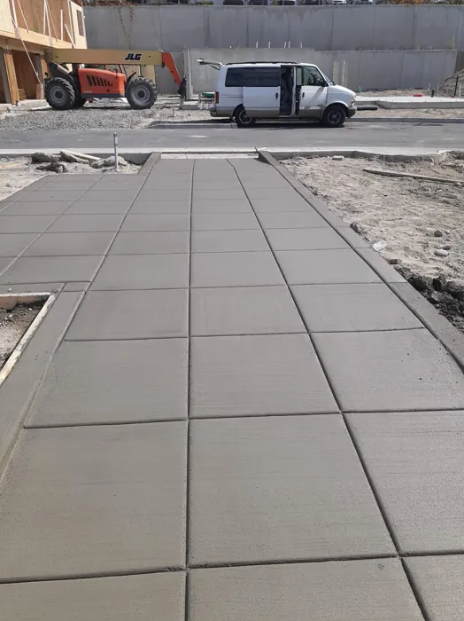 Broom-finished concrete driveway