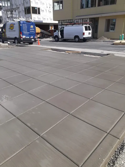 Broom-finished concrete driveway